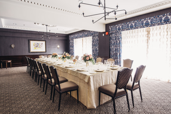 Elegant banquet table in Vineyard Room, ideal for corporate events and gatherings.