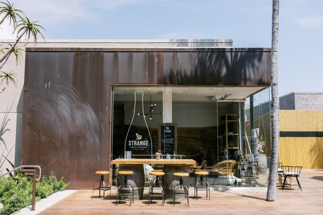 Modern Vineyard Room venue with outdoor seating for casual meetings and networking events.