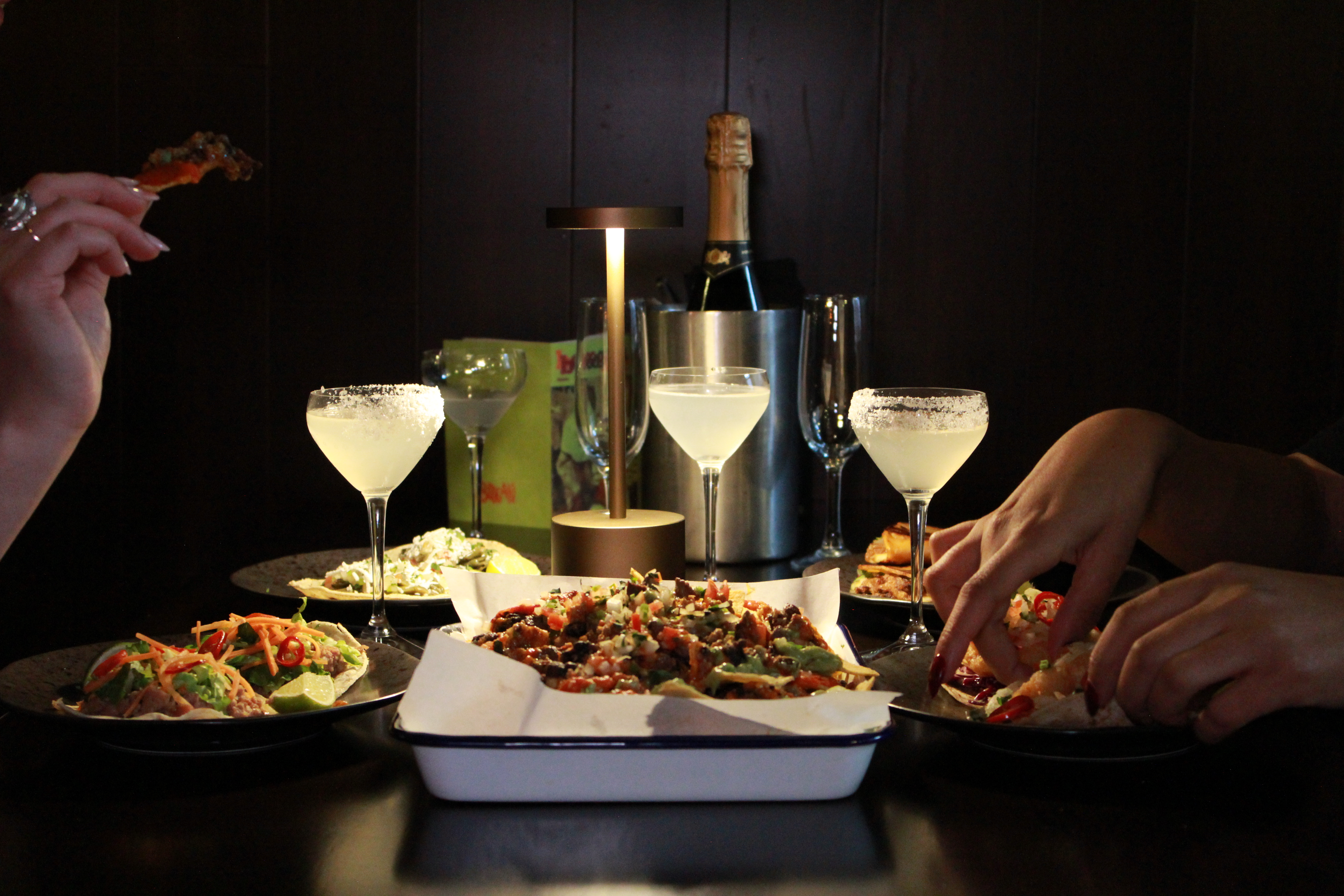 Stylish dining setup at BASEMENT, Boogalú for networking events and intimate gatherings.