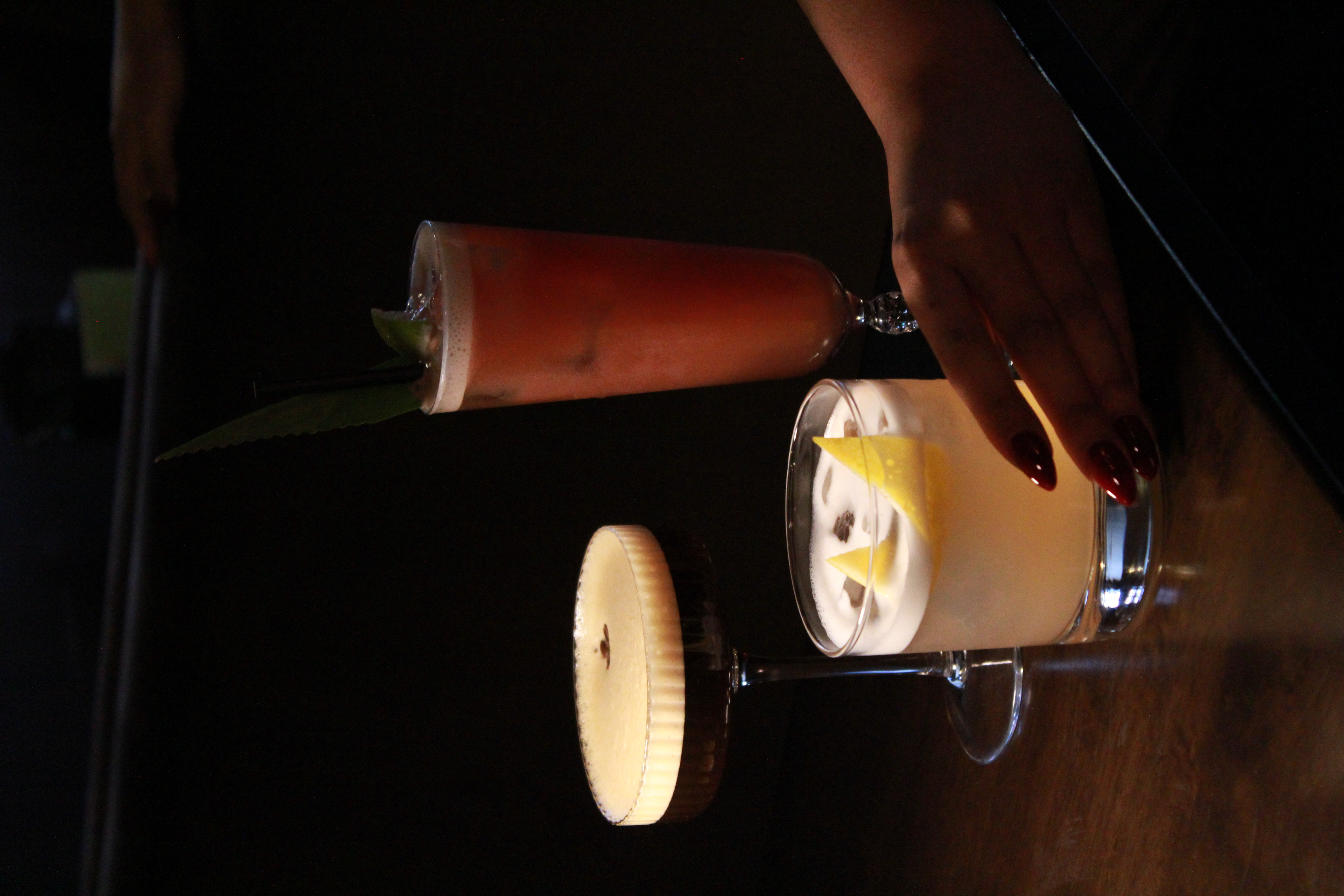 Stylish cocktails in elegant glassware at Boogalú for upscale networking events.