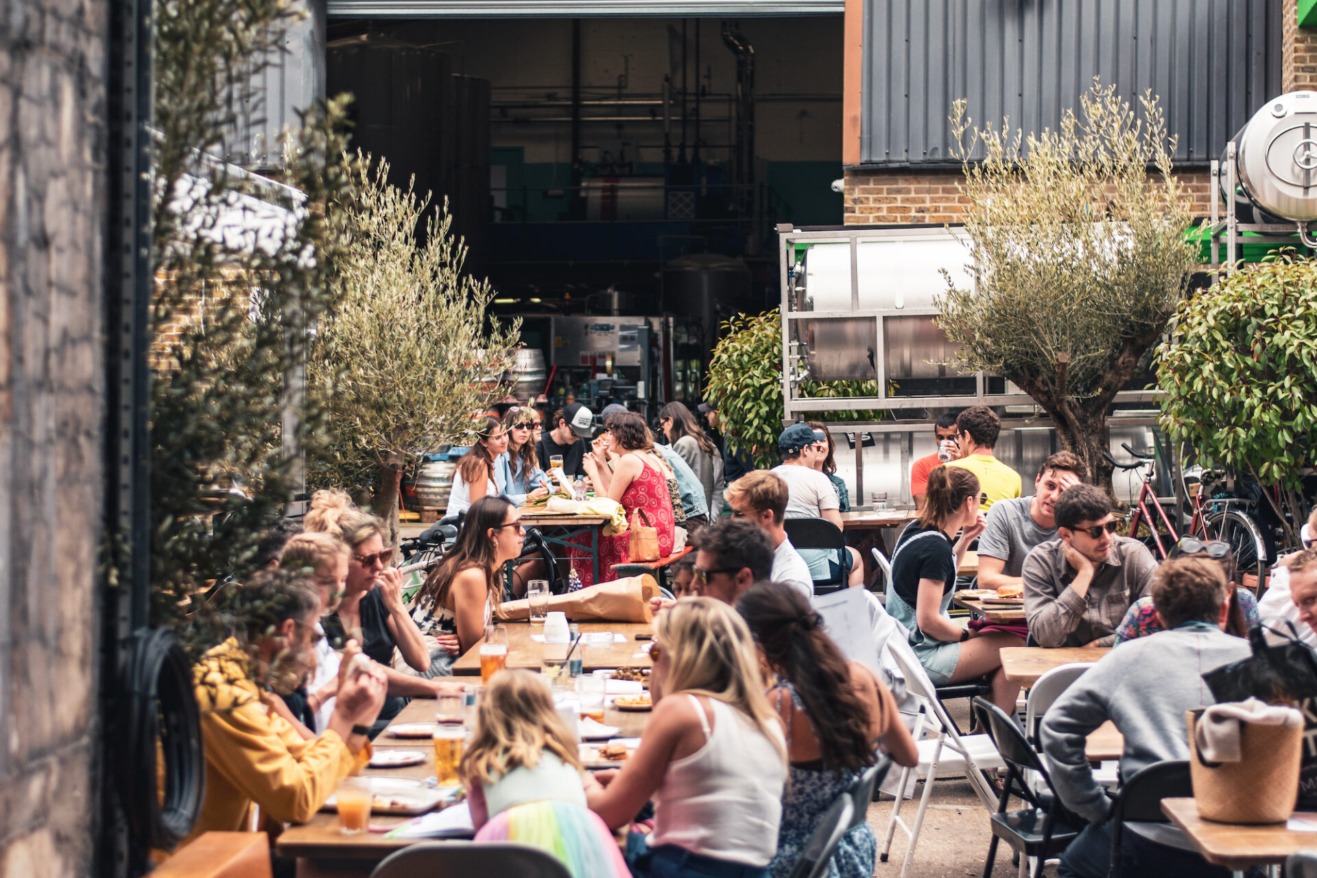 Vibrant outdoor courtyard at Five Points Taproom for casual networking events.