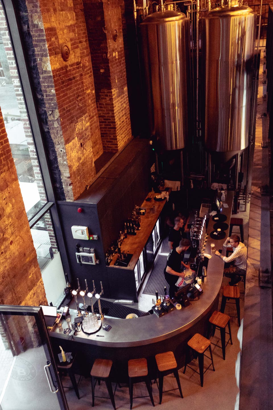 Private Stack Room at Sambrook's Brewery Tap, modern bar with exposed brick, ideal for events.