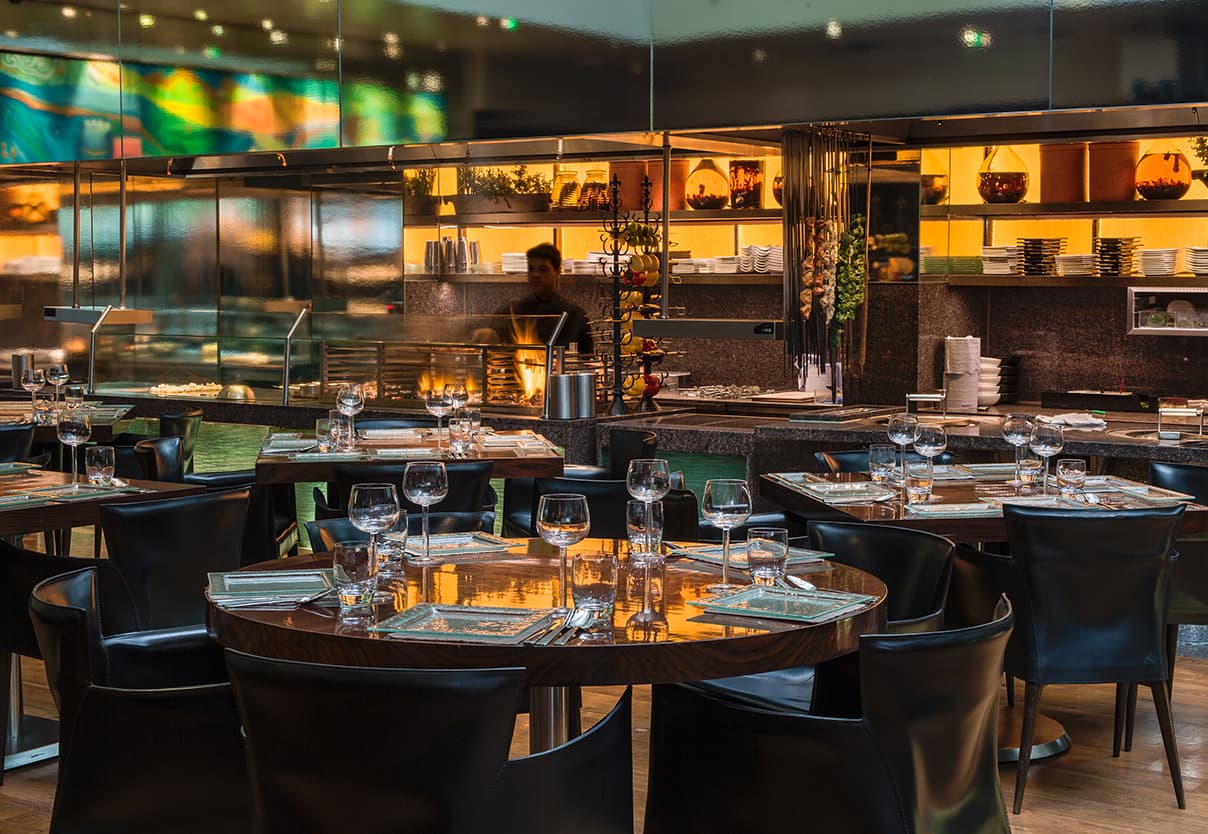 Private dining room at Amaya Grill, elegant table settings for upscale events.