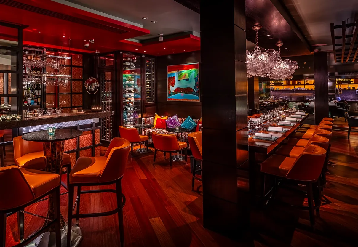 Private dining room at Amaya Grill, stylish decor for intimate gatherings and corporate events.