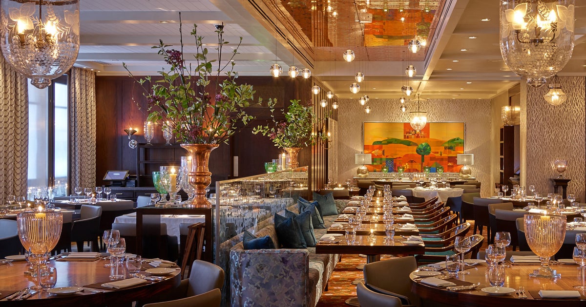 Elegant Pukka Bar dining space with ambient lighting for upscale events and meetings.