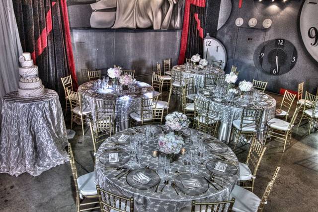 Elegant banquet hall with round tables, ideal for weddings and upscale events.