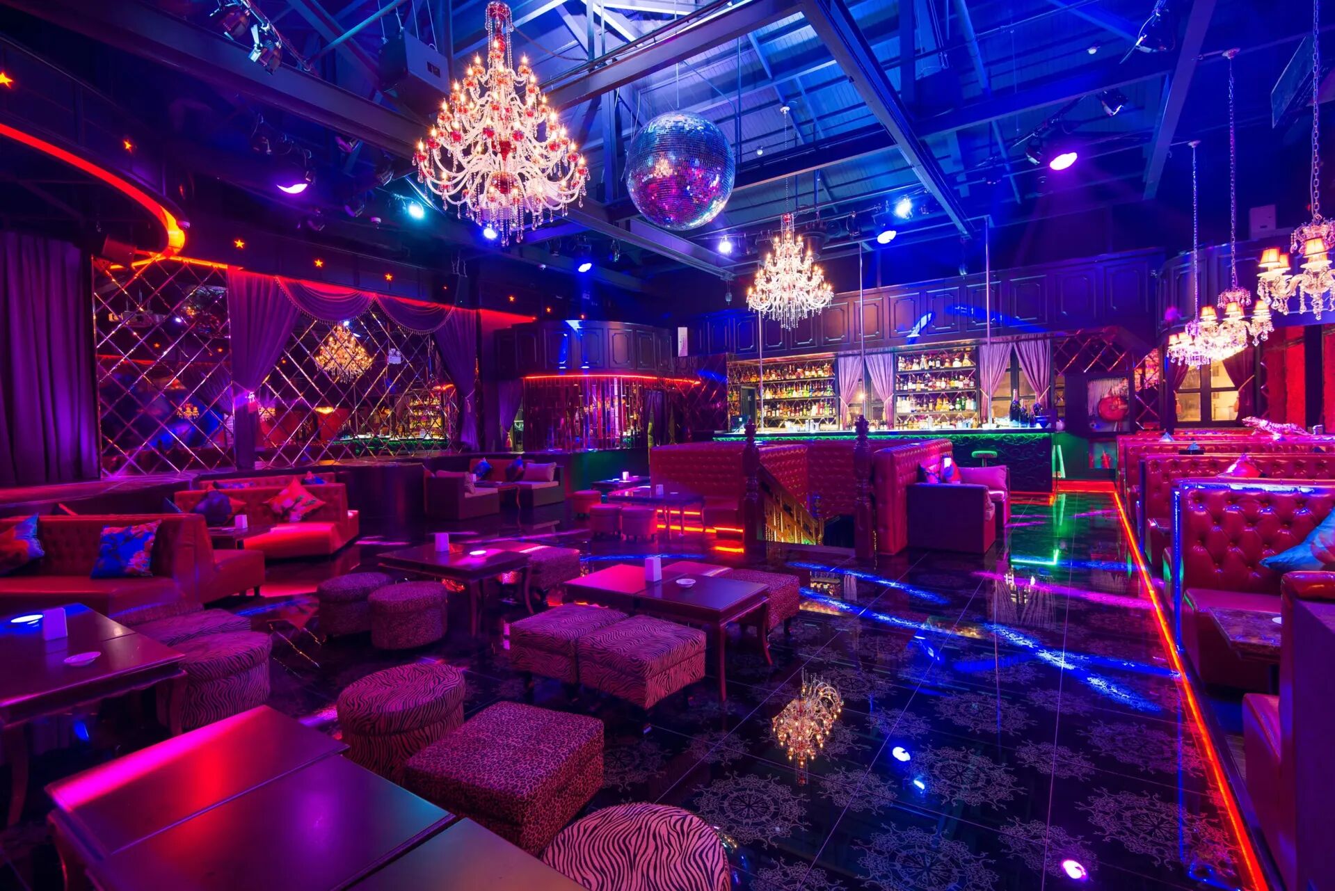 Vibrant event hall with stylish seating, perfect for networking and cocktail parties.