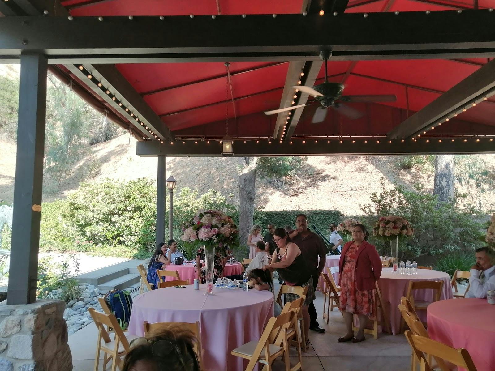 Brandview Garden outdoor event space with pink tables, perfect for weddings and celebrations.