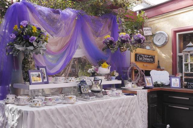 Elegant table setting with floral decor at Bexx Secret Garden tea party venue.