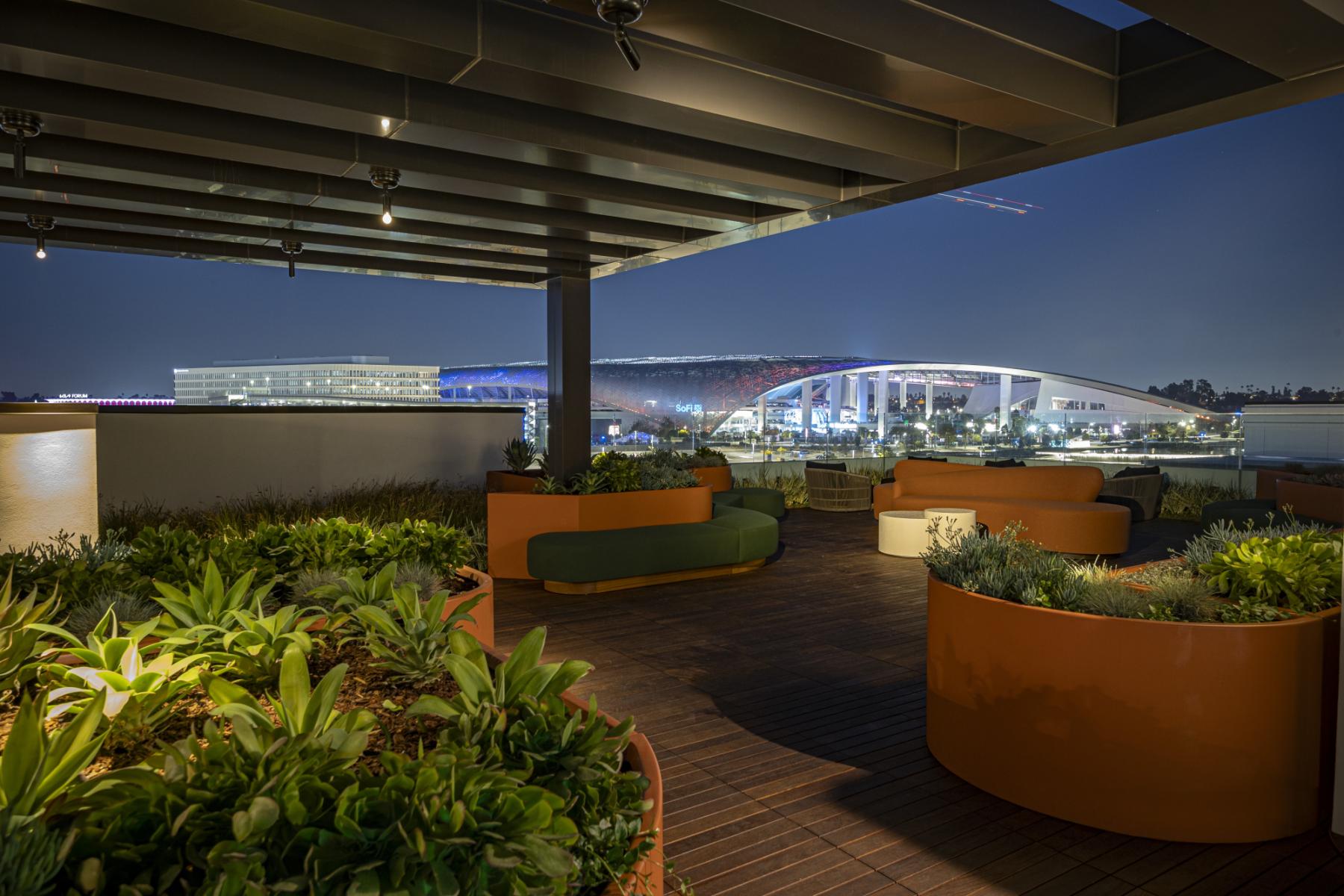 Stylish rooftop venue at The Crosby with stadium view, ideal for upscale events.