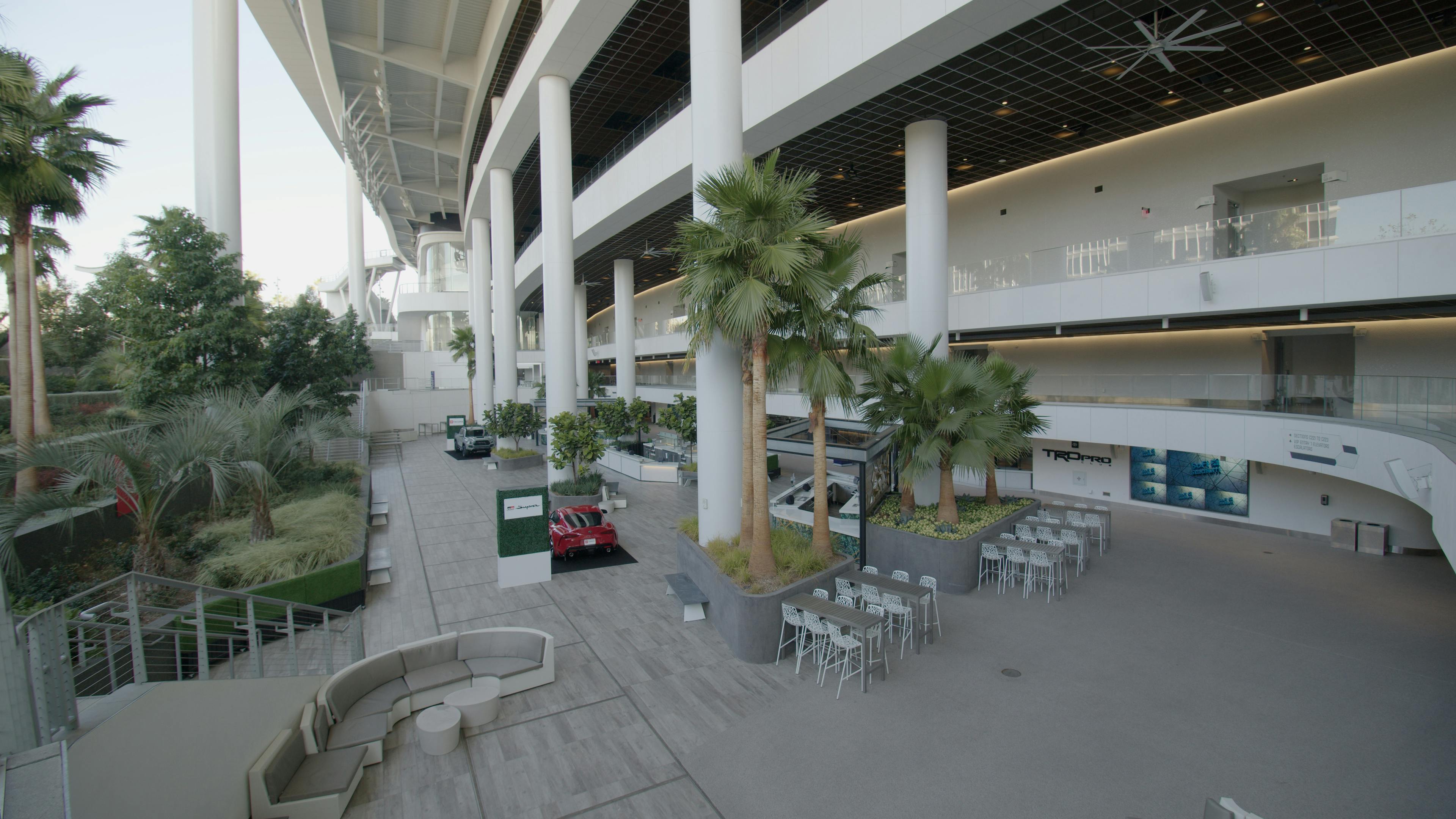 Spacious Patio Club at SoFi Stadium, ideal for events with modern design and natural light.