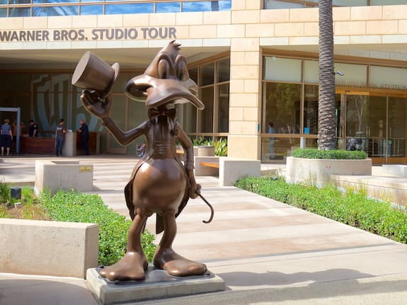 Whimsical bronze cartoon statue in Warner Bros. Studios' Terrace Room for events.