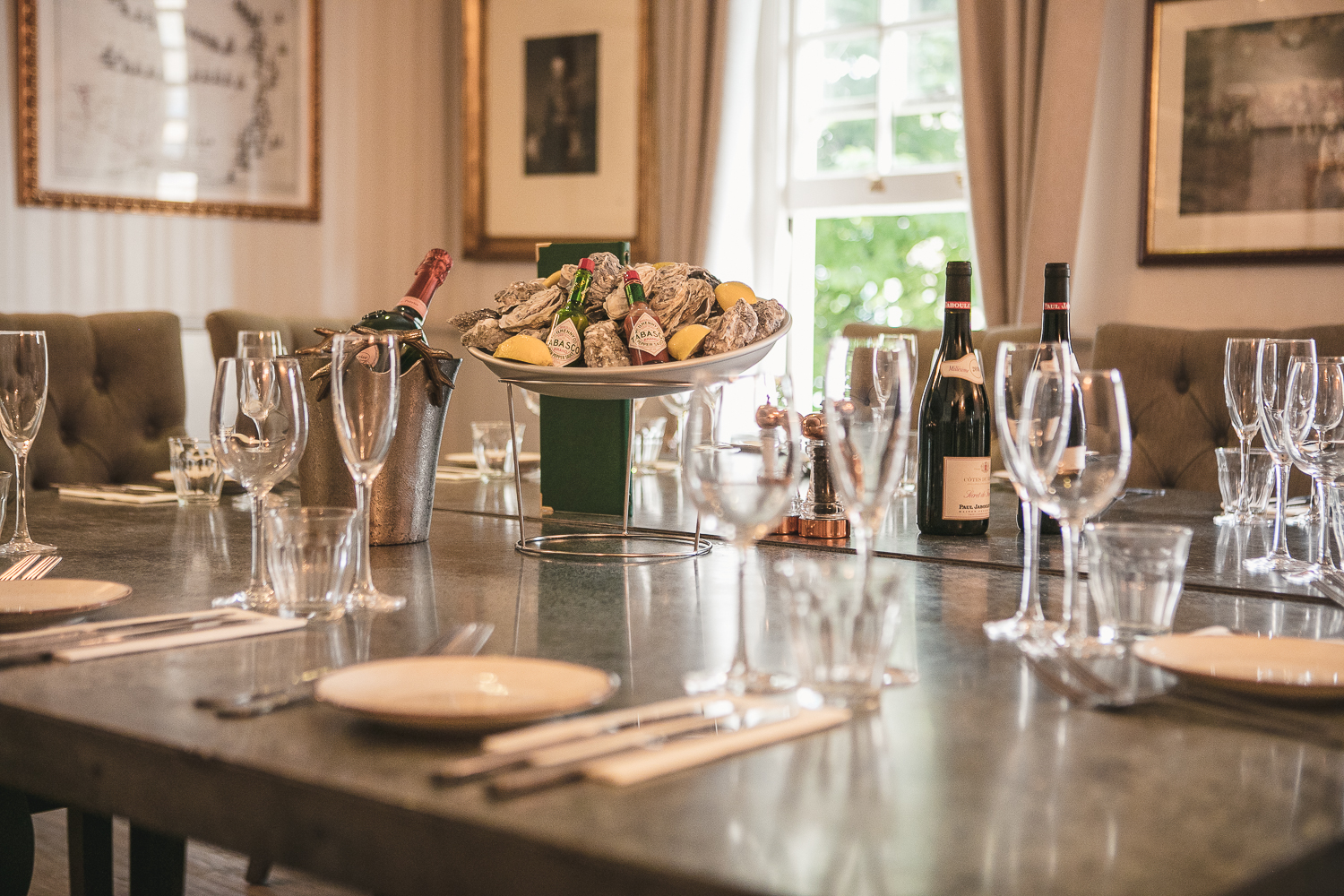 Elegant dining table with seafood centerpiece for corporate meetings at The Somers Town Coffee House.