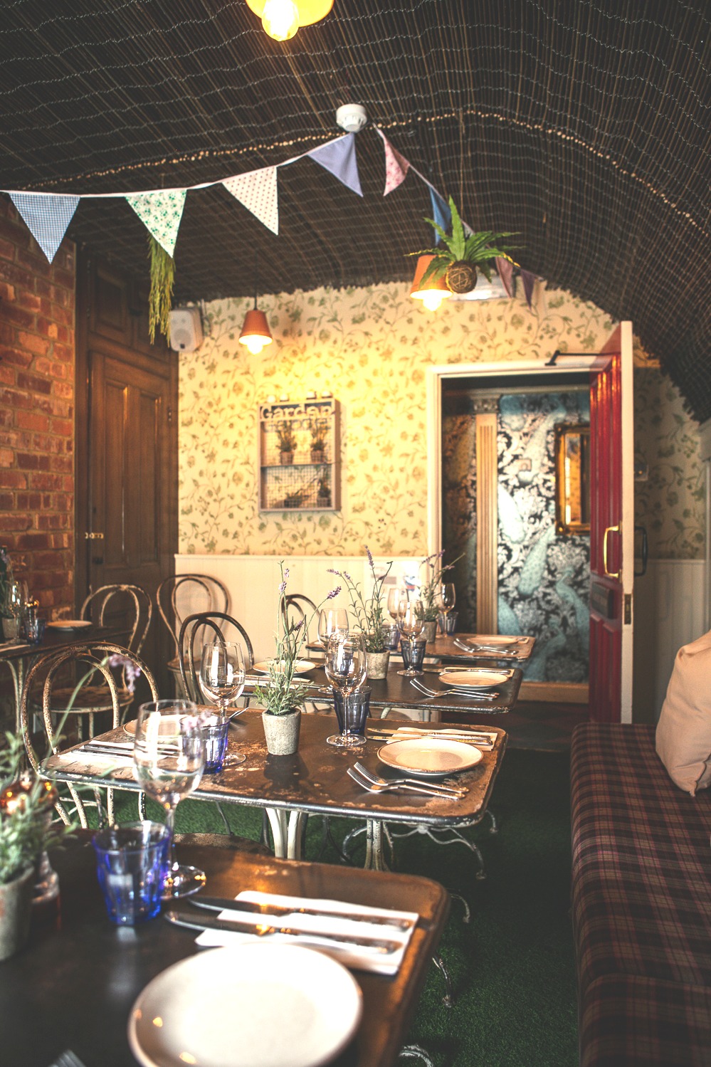 Intimate dining space with floral decor, ideal for upscale dinners and private events.