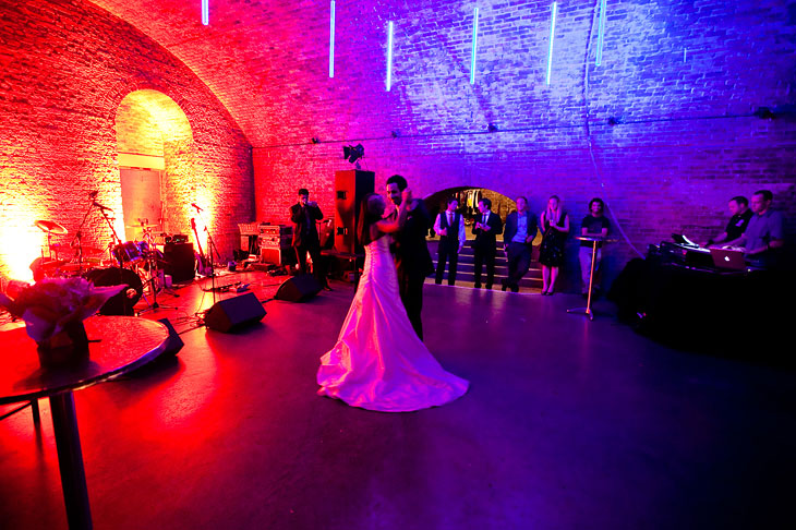 Vibrant wedding venue with dynamic lighting, perfect for celebrations and events.