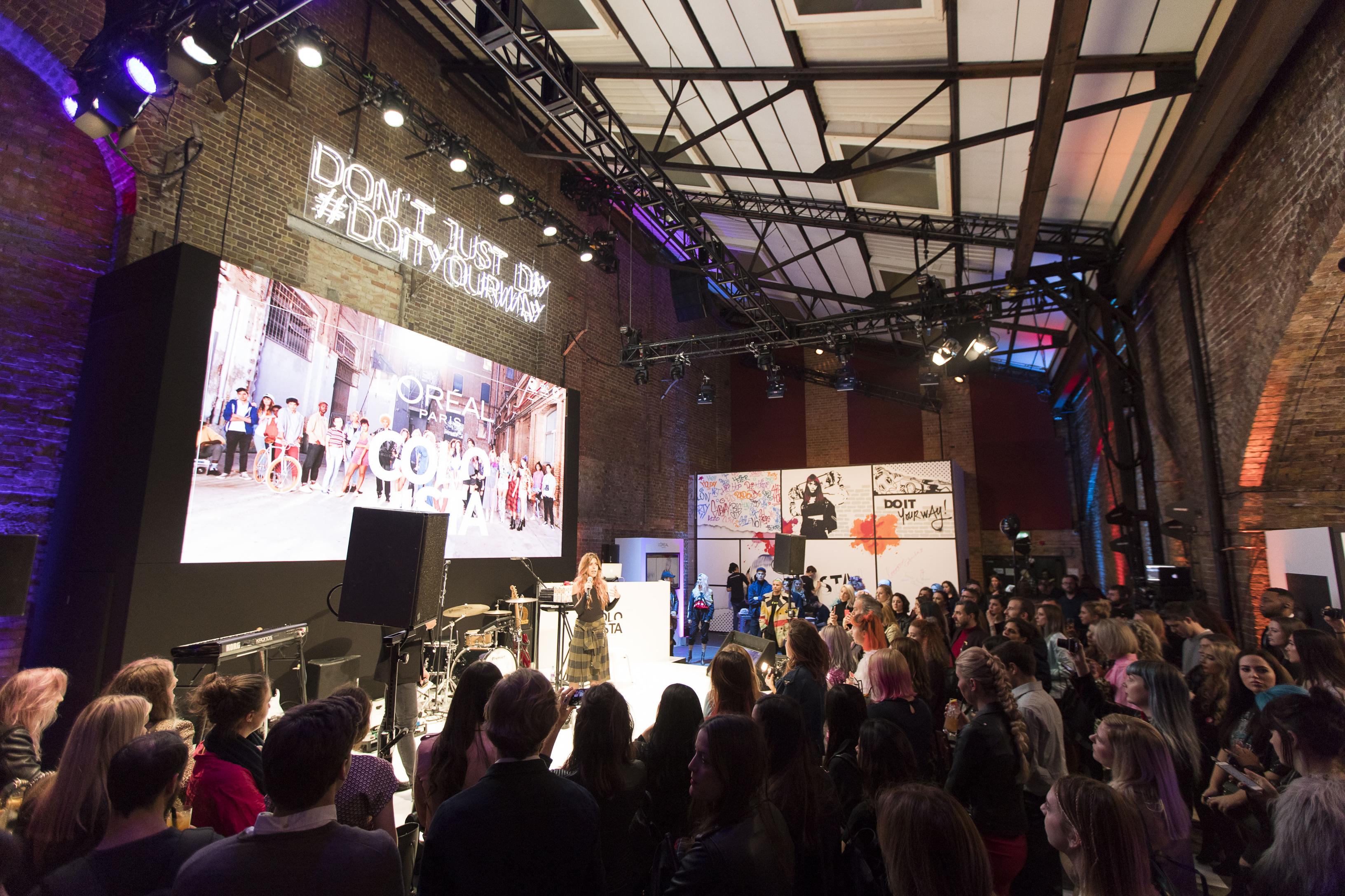Dynamic event space at Village Underground with engaged audience and effective staging.