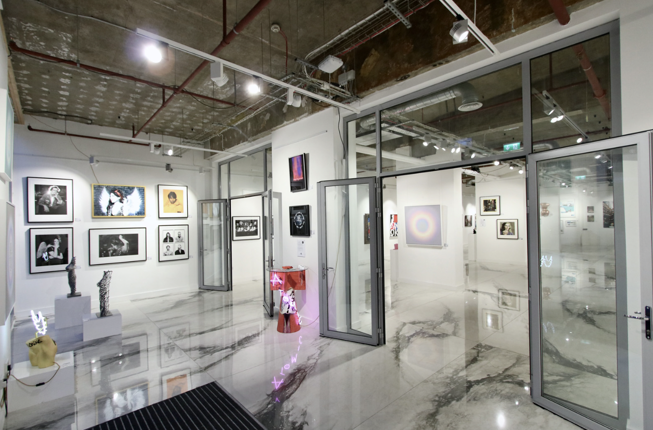 Modern art gallery with marble flooring, ideal for upscale events and exhibitions.