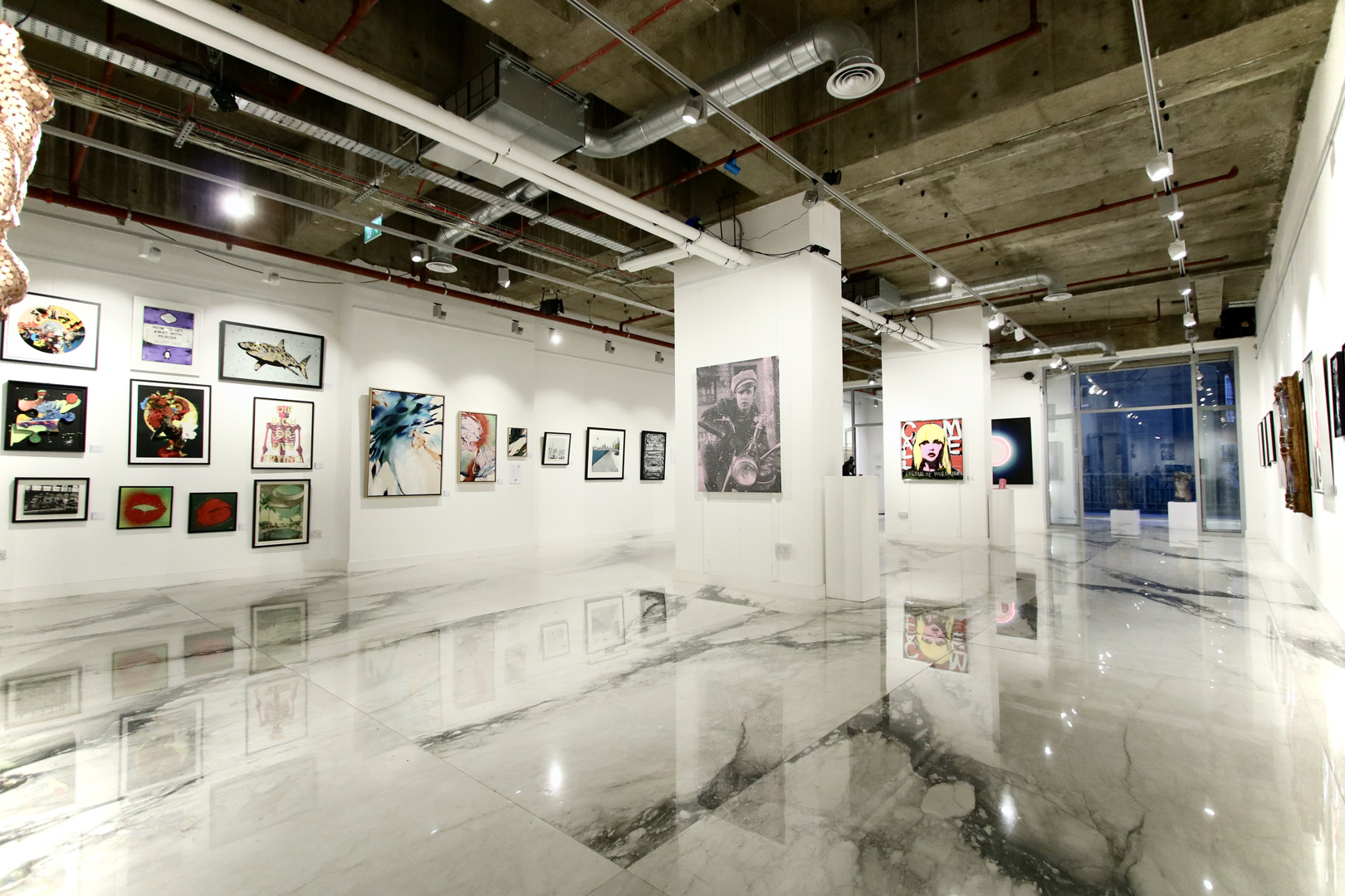 Spacious Brunswick Art Gallery with polished marble floors, ideal for exhibitions and events.