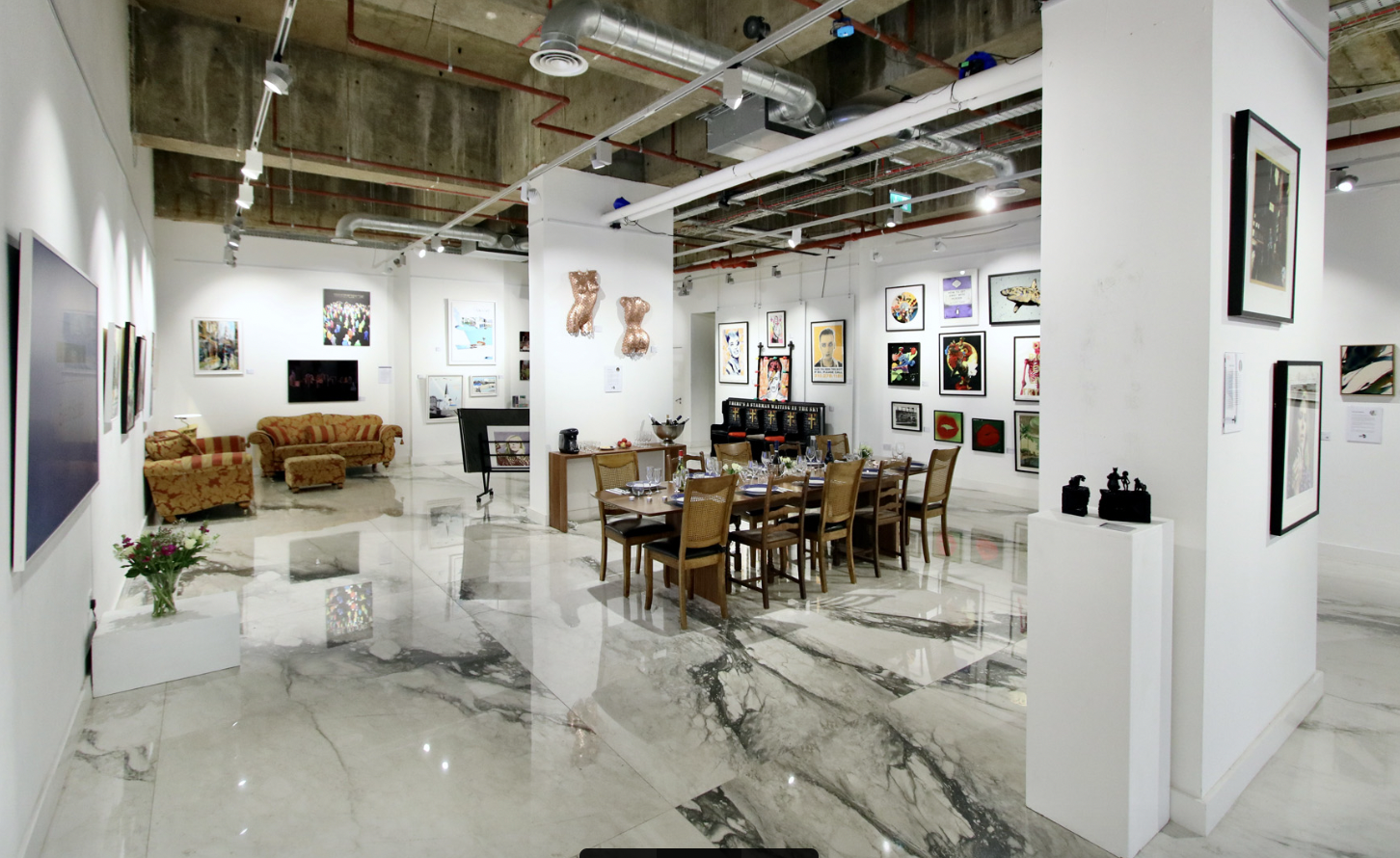 Versatile Brunswick Art Gallery event space with polished marble floors for corporate meetings.