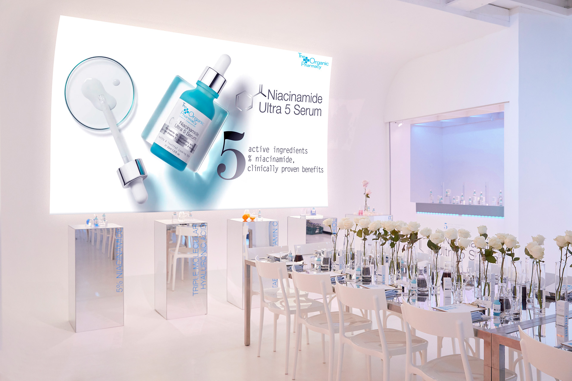 Modern event space for product launch featuring Niacinamide Ultra Serum display.