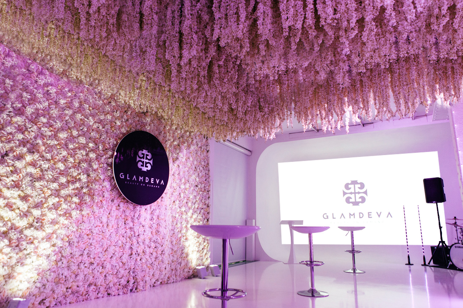 Elegant event space with floral ceiling for GLAMDEVA product launch and press events.