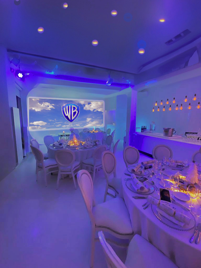 Private dining space with elegant table settings for corporate events and presentations.