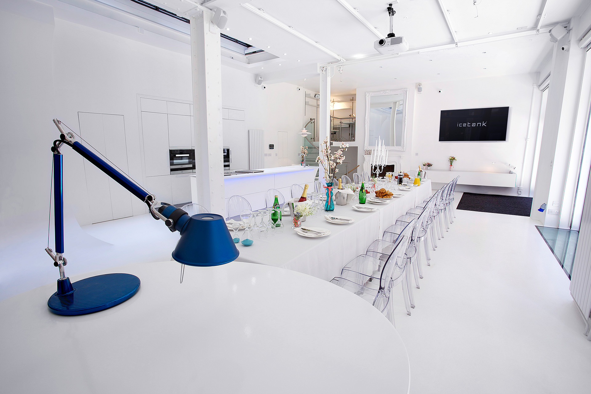 Modern corporate event space with sleek decor, ideal for meetings and workshops.