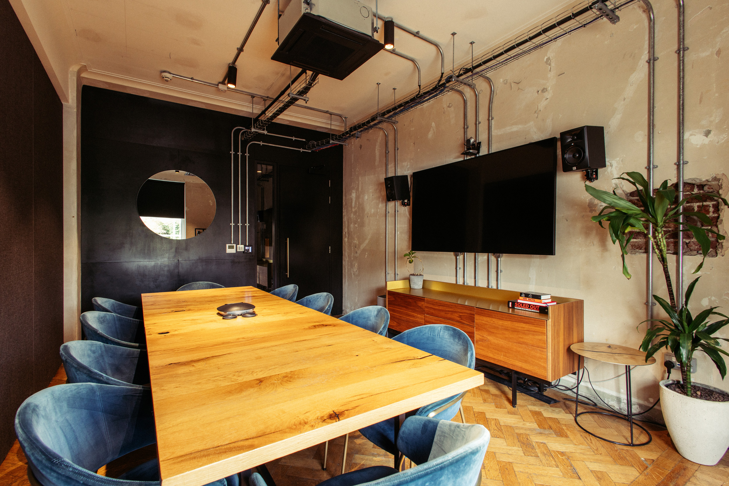 Ministry boardroom: wood table, AV, corporate event