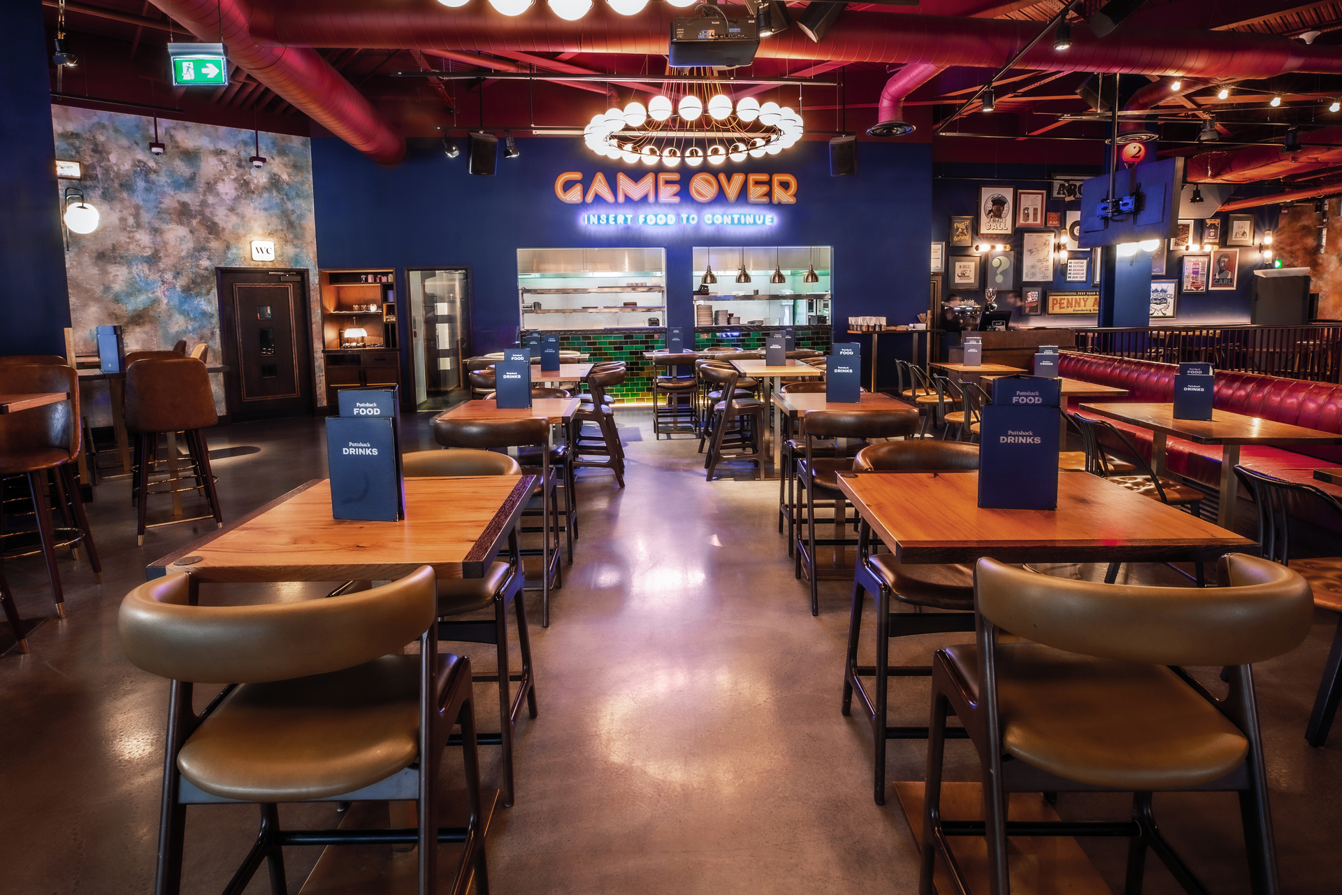 Christmas event space with vibrant decor and flexible seating for corporate gatherings.