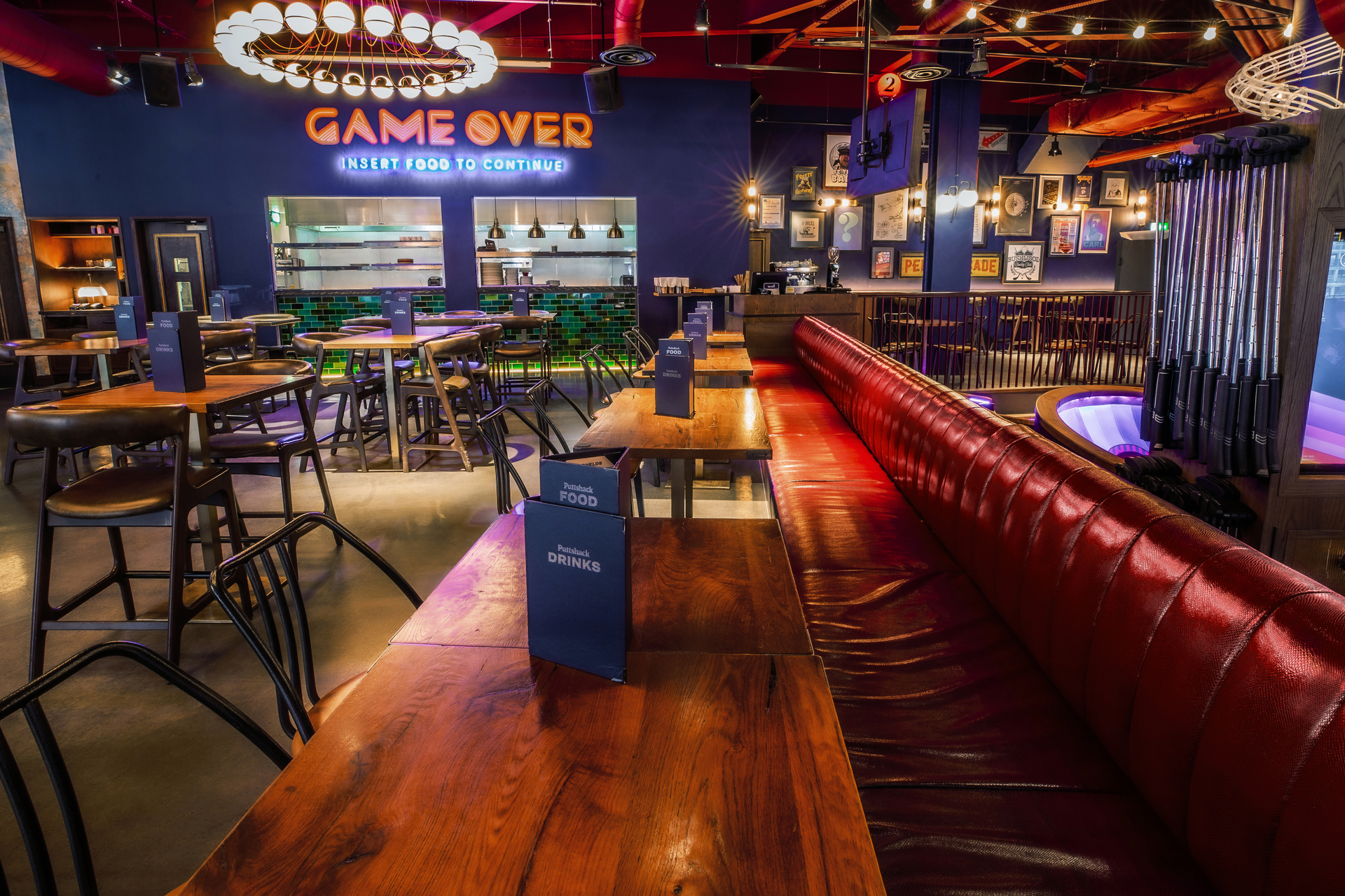 Christmas event space at Puttshack White City with vibrant decor and fun activities.