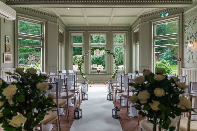 Elegant wedding venue with lush decor and natural light in Worplesdon Place.