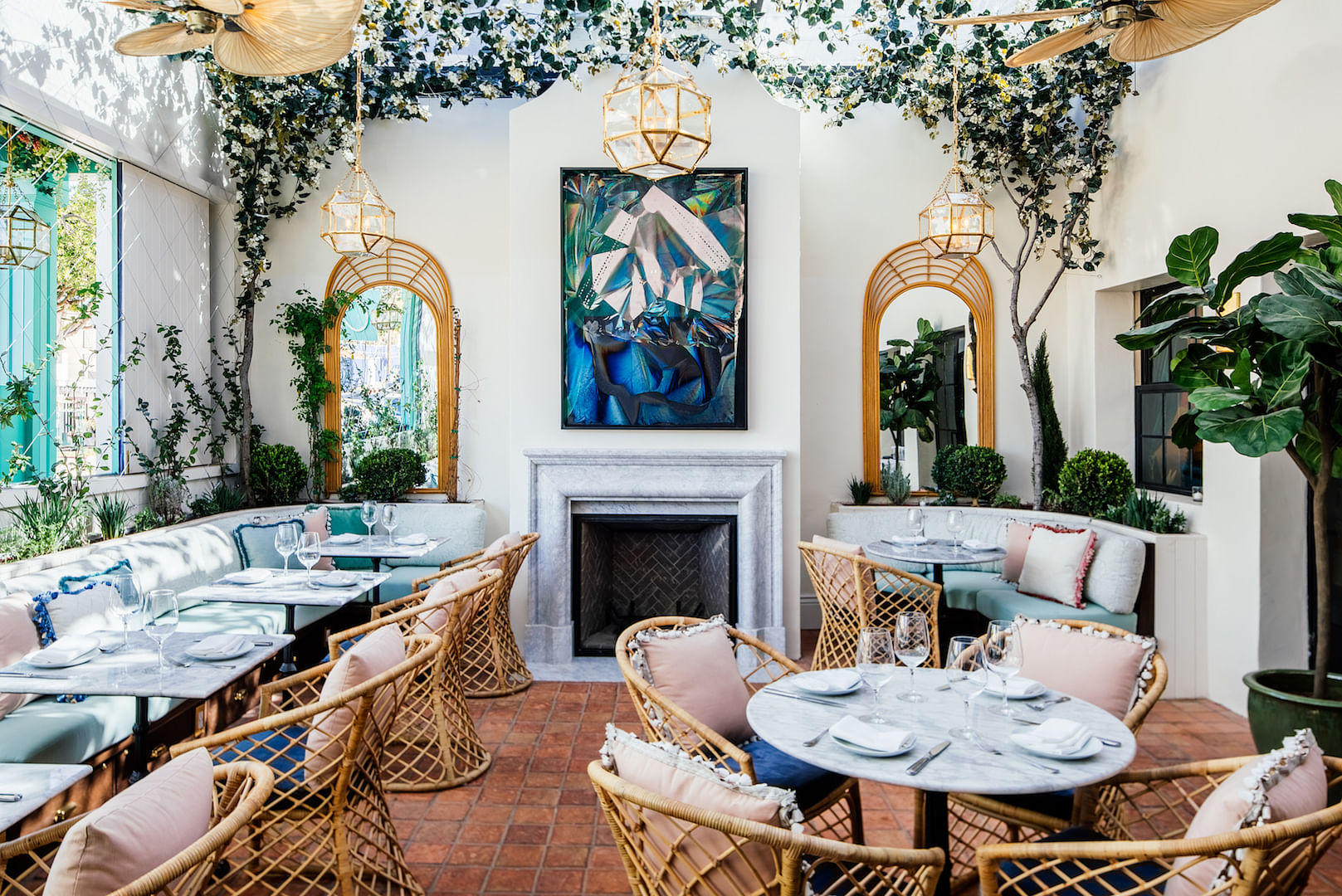 Elegant lounge in Olivetta with cozy fireplace, ideal for upscale events and gatherings.