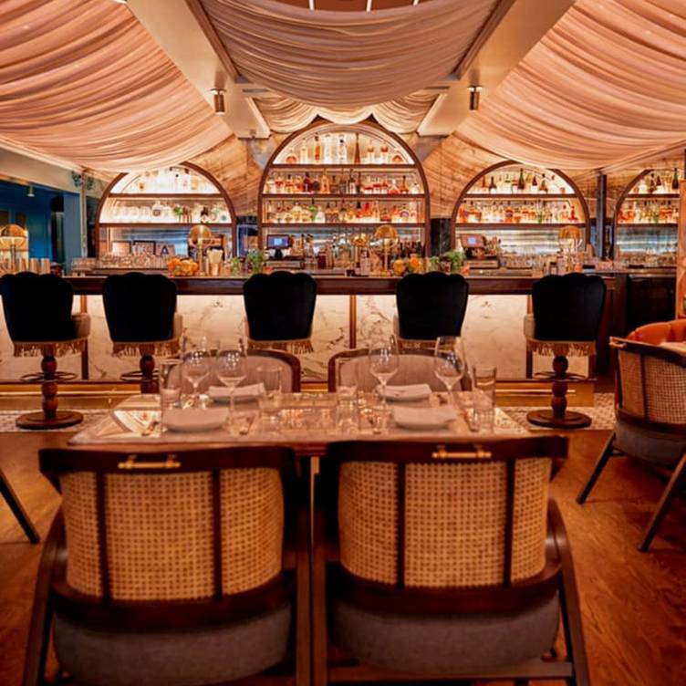 Stylish bar in Olivetta with elegant seating for cocktail receptions and private dinners.