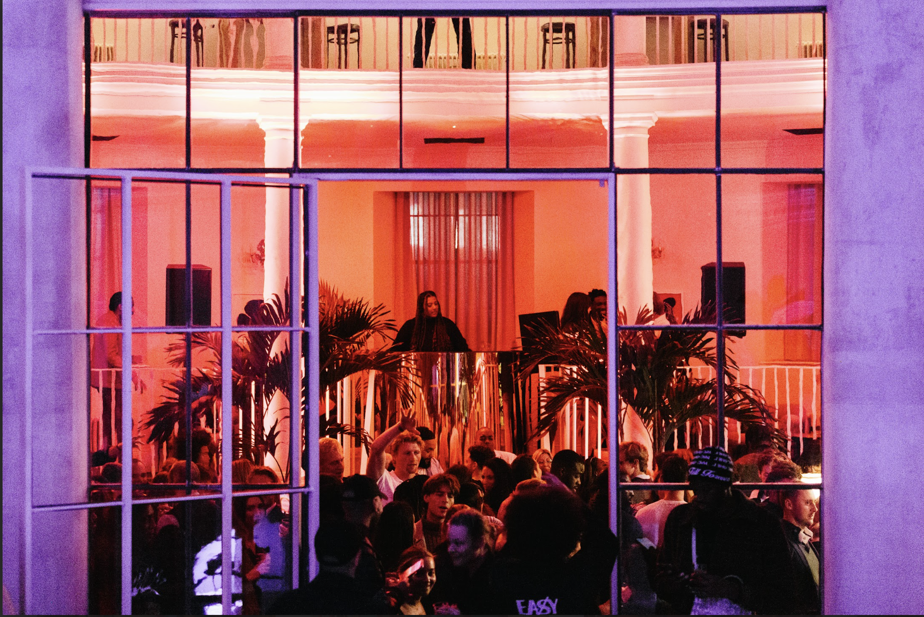 Vibrant Courtroom Bar event space with warm lighting, ideal for networking and celebrations.