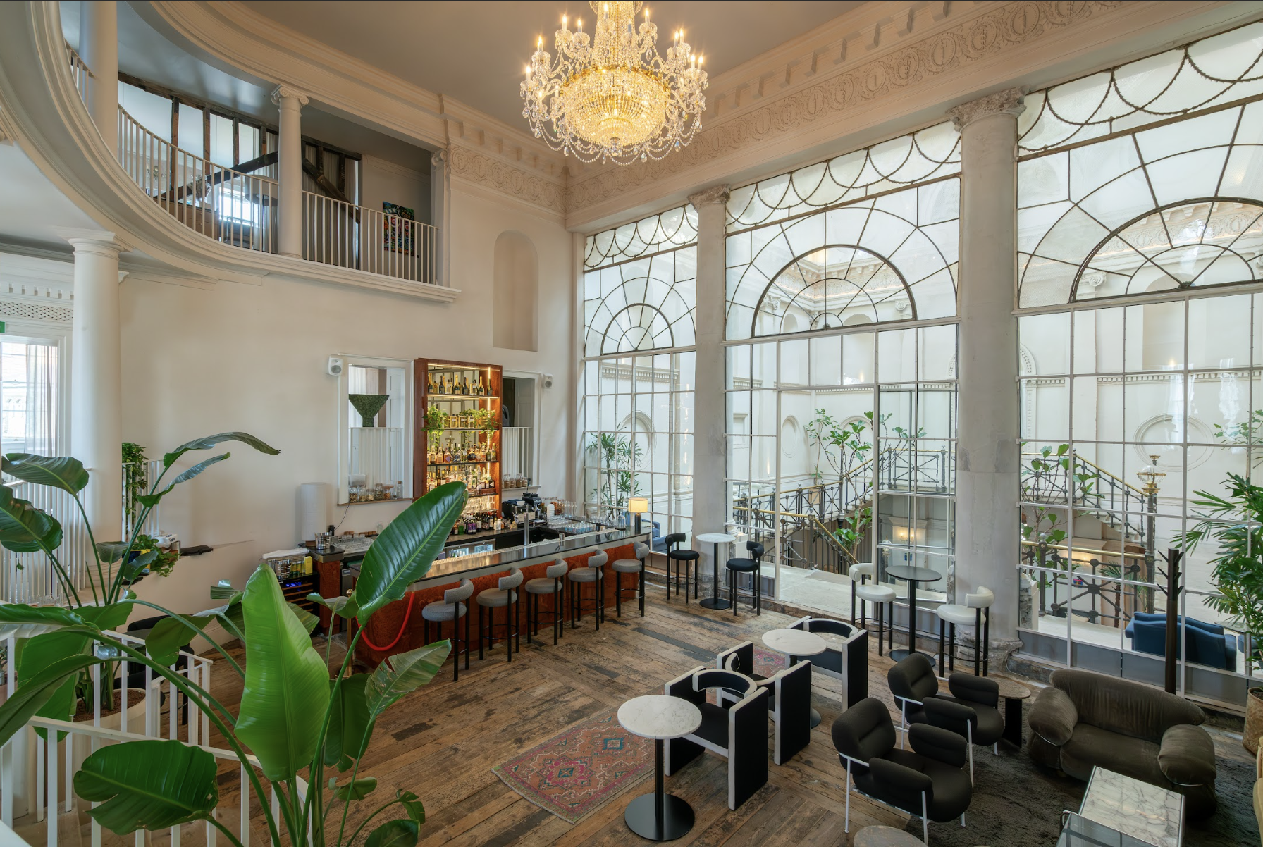 Sophisticated event space with elegant bar, ideal for networking and receptions.