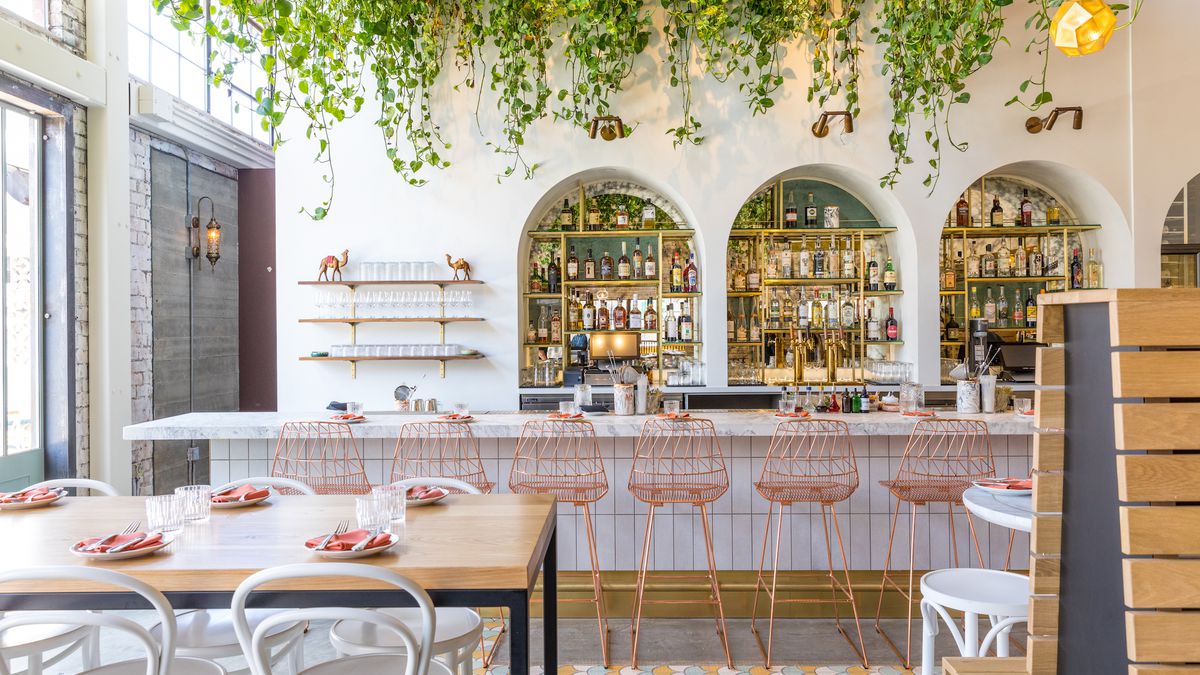 Main Dining Room at Bavel with modern bar, ideal for gatherings and networking events.