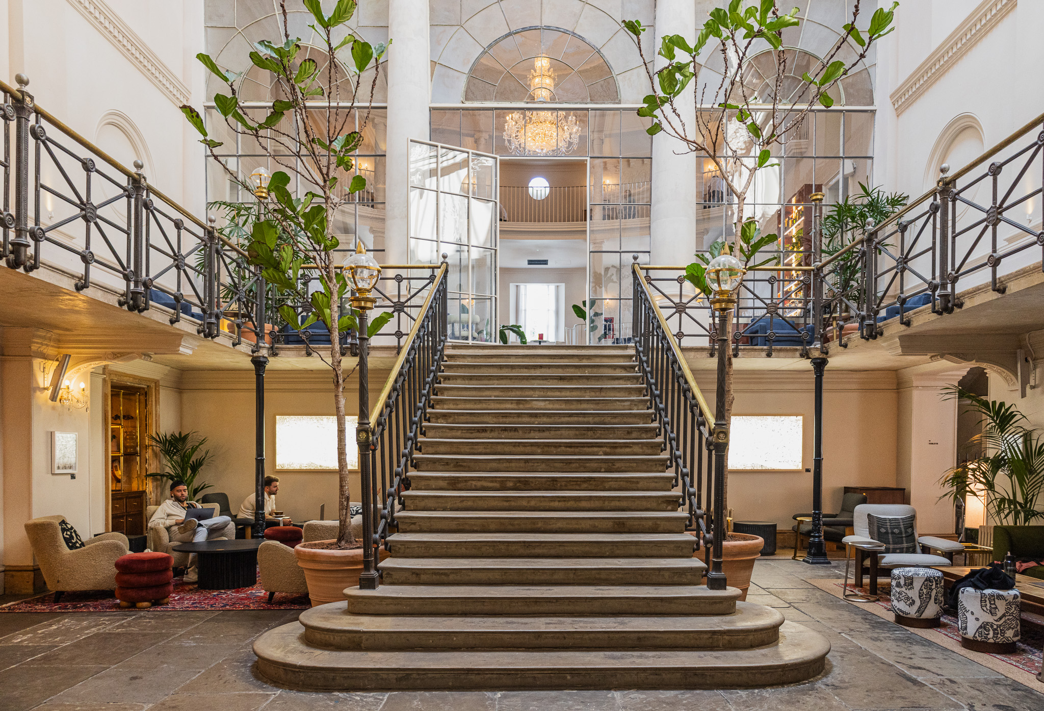 Full House Takeover at Knotel Workclub, featuring a grand staircase and elegant venue.
