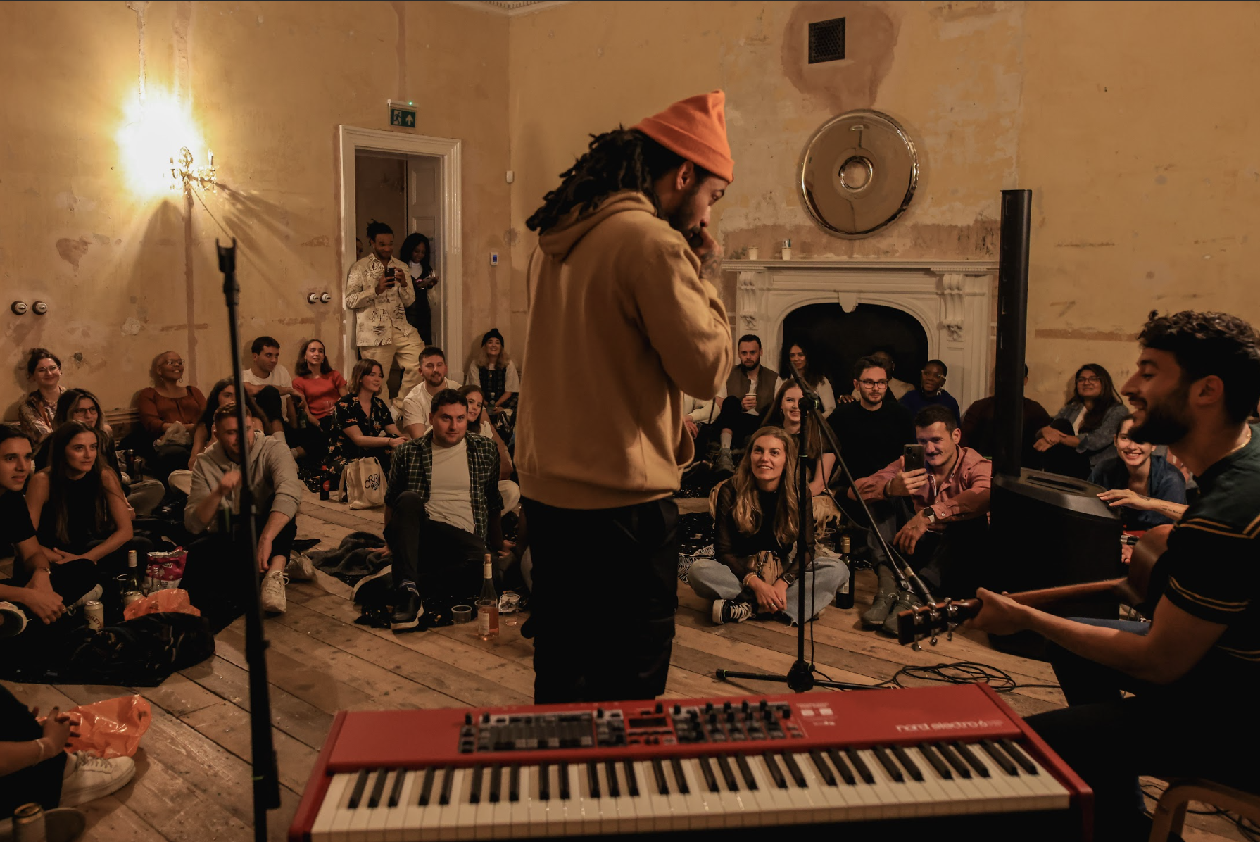 Intimate live performance at Full House Takeover, ideal for acoustic sessions and workshops.