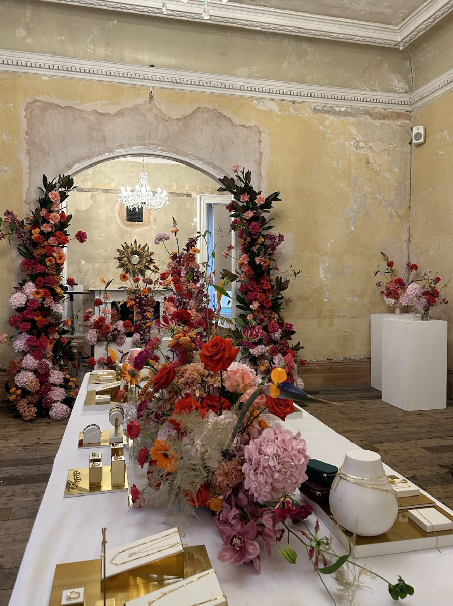 Elegant event space with floral arrangements for weddings and upscale gatherings.