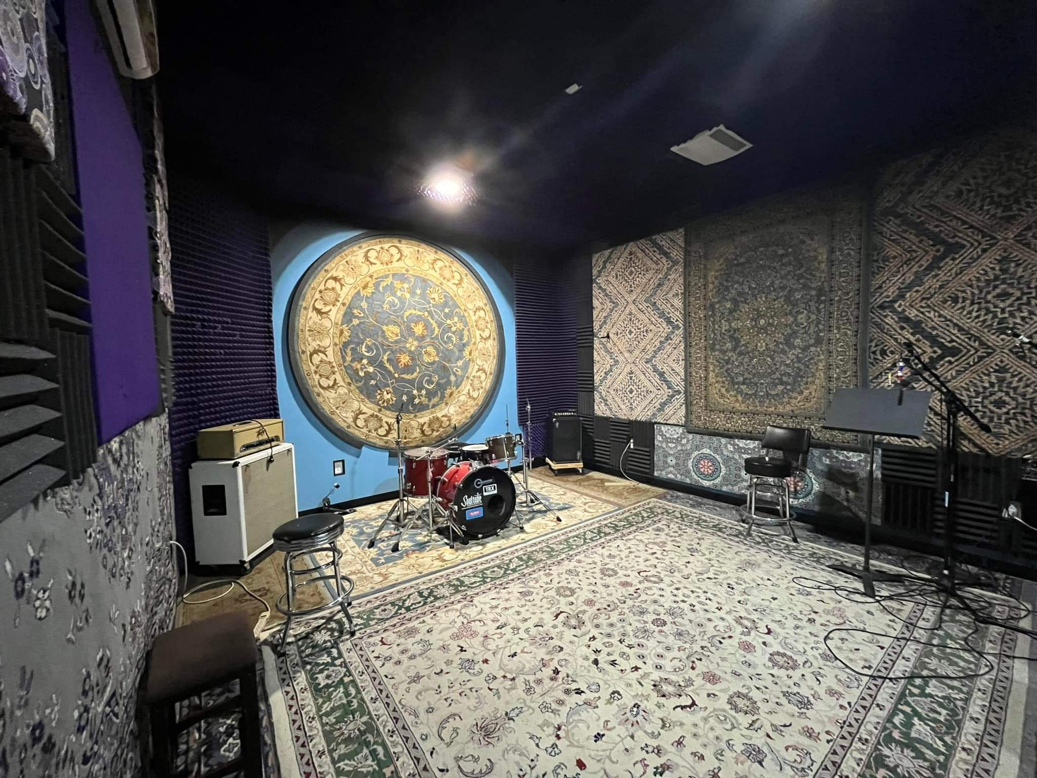 Control Room at Grooveworks Studios, vibrant decor for music events and workshops.