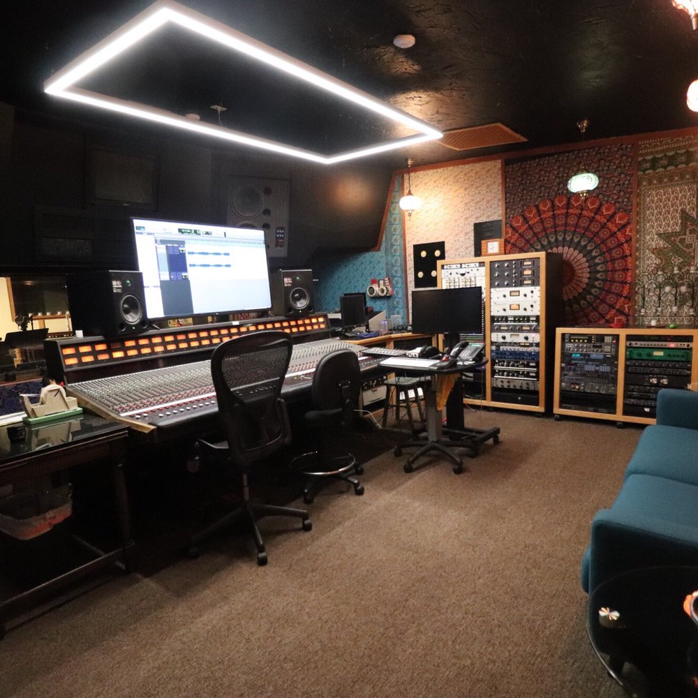 Professional recording studio with advanced sound equipment for audio events and workshops.