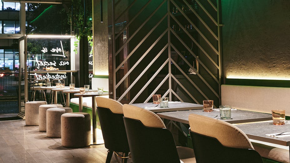 Private room at Bennie Restaurant & Bar, modern decor for intimate gatherings and meetings.