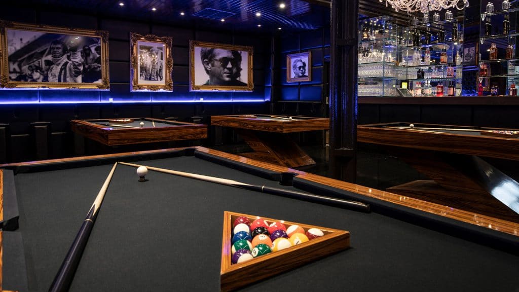 Stylish billiards room with elegant decor for networking events and team-building activities.