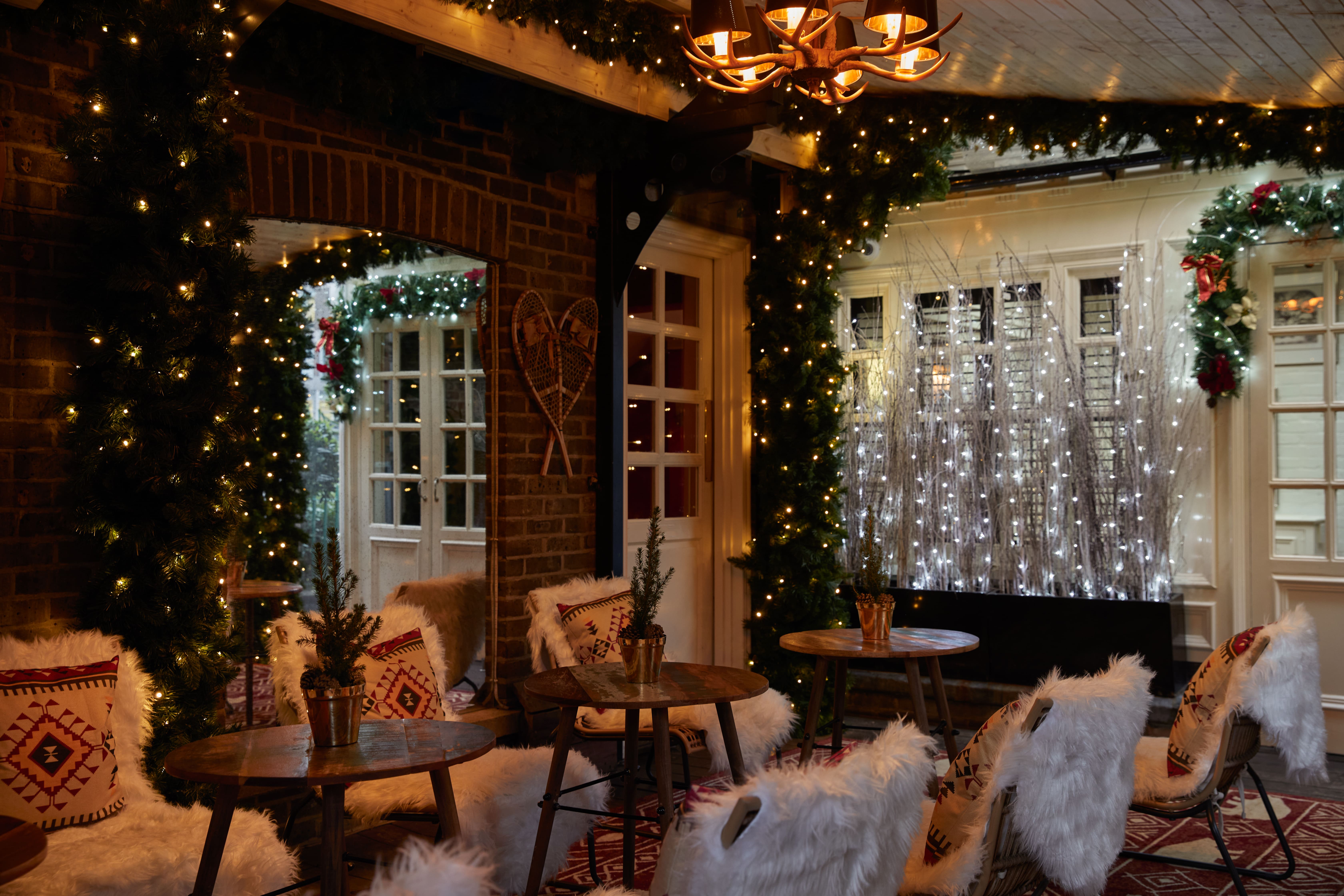 Winter Lodge event space with cozy decor, ideal for holiday parties and gatherings.