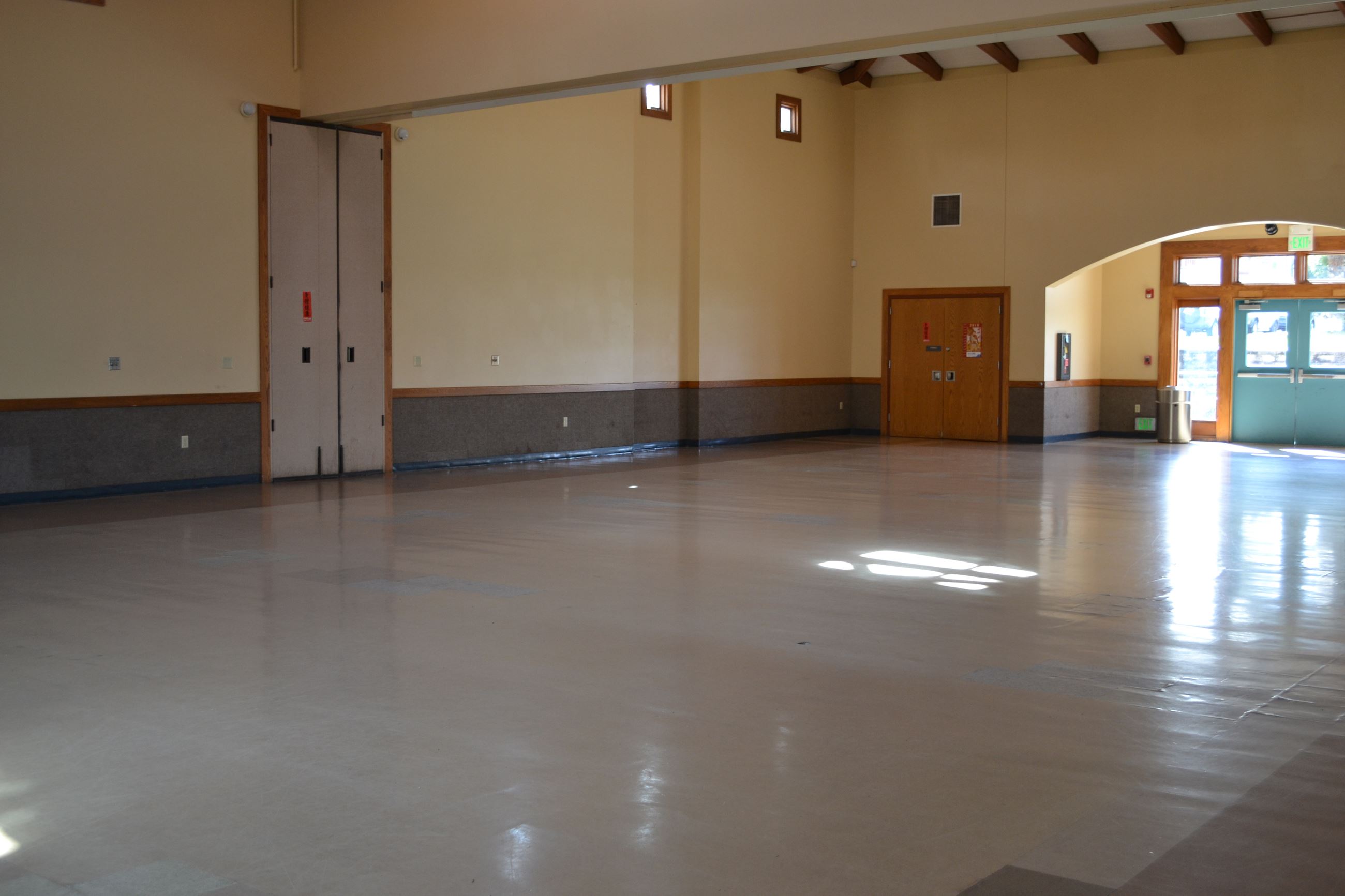 Spacious Bayshore Community Center event space with natural light for meetings and workshops.