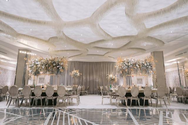 Elegant event space with textured ceiling, ideal for corporate events and weddings.