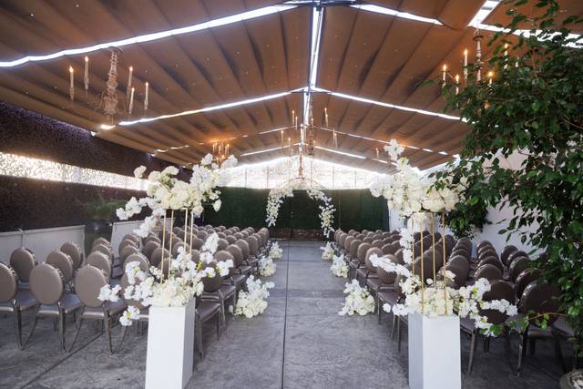 Elegant wedding venue with floral decor and romantic ambiance at Bella Blanca Events.