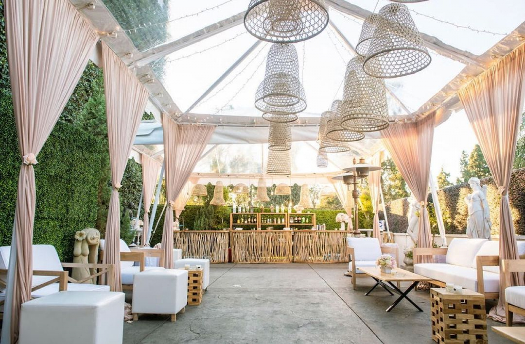 Elegant outdoor event space at Bella Blanca with stylish seating, ideal for weddings and corporate events.