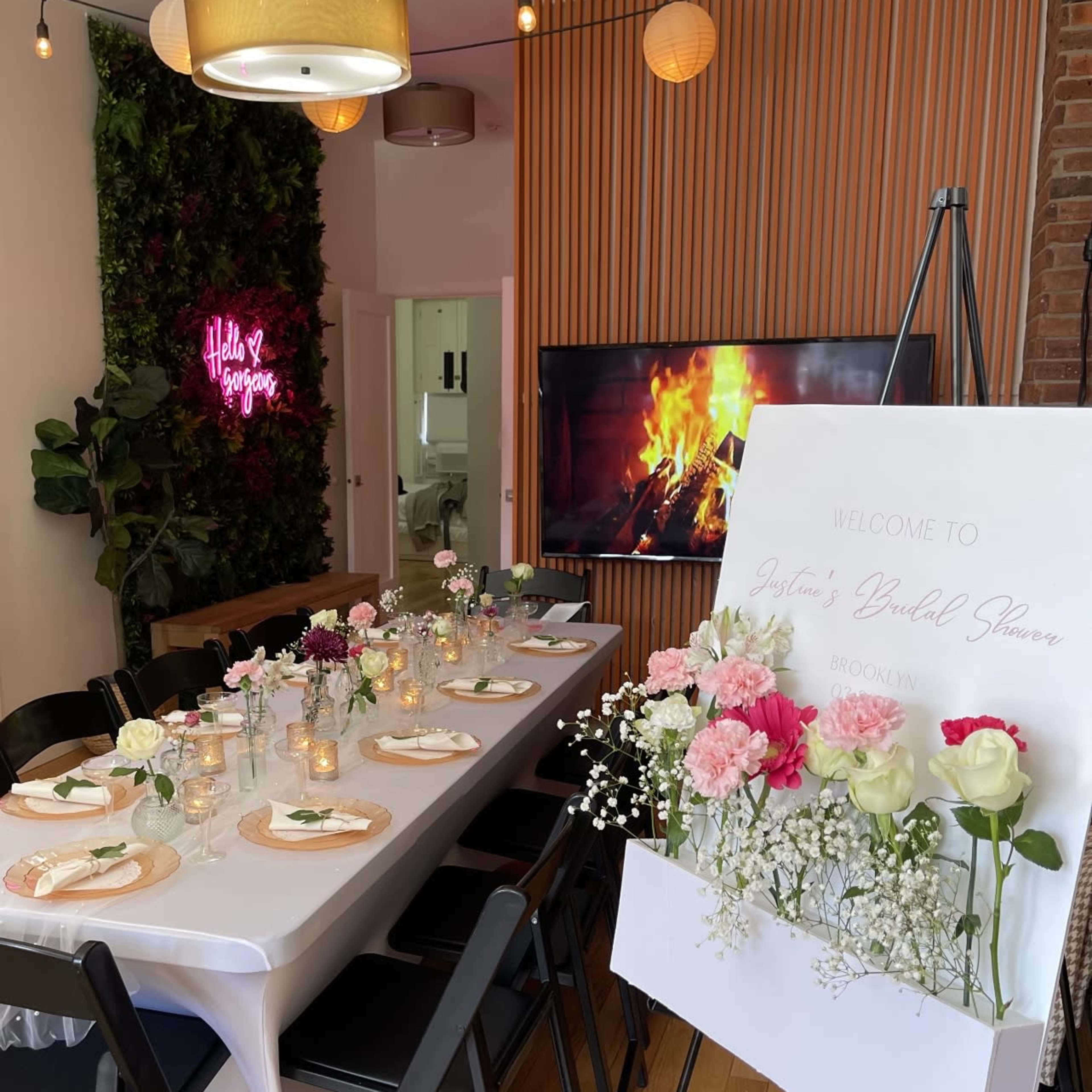 Private dinner setup with floral centerpieces for intimate celebrations and gatherings.