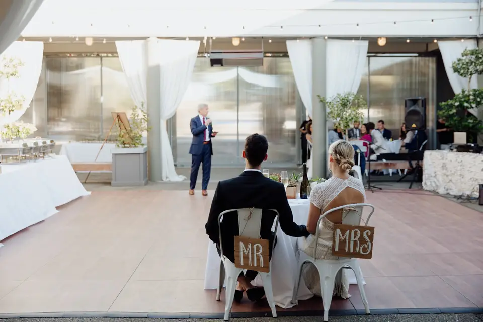 Elegant wedding reception at Treasure Island with "MR" and "MRS" signs, perfect for events.